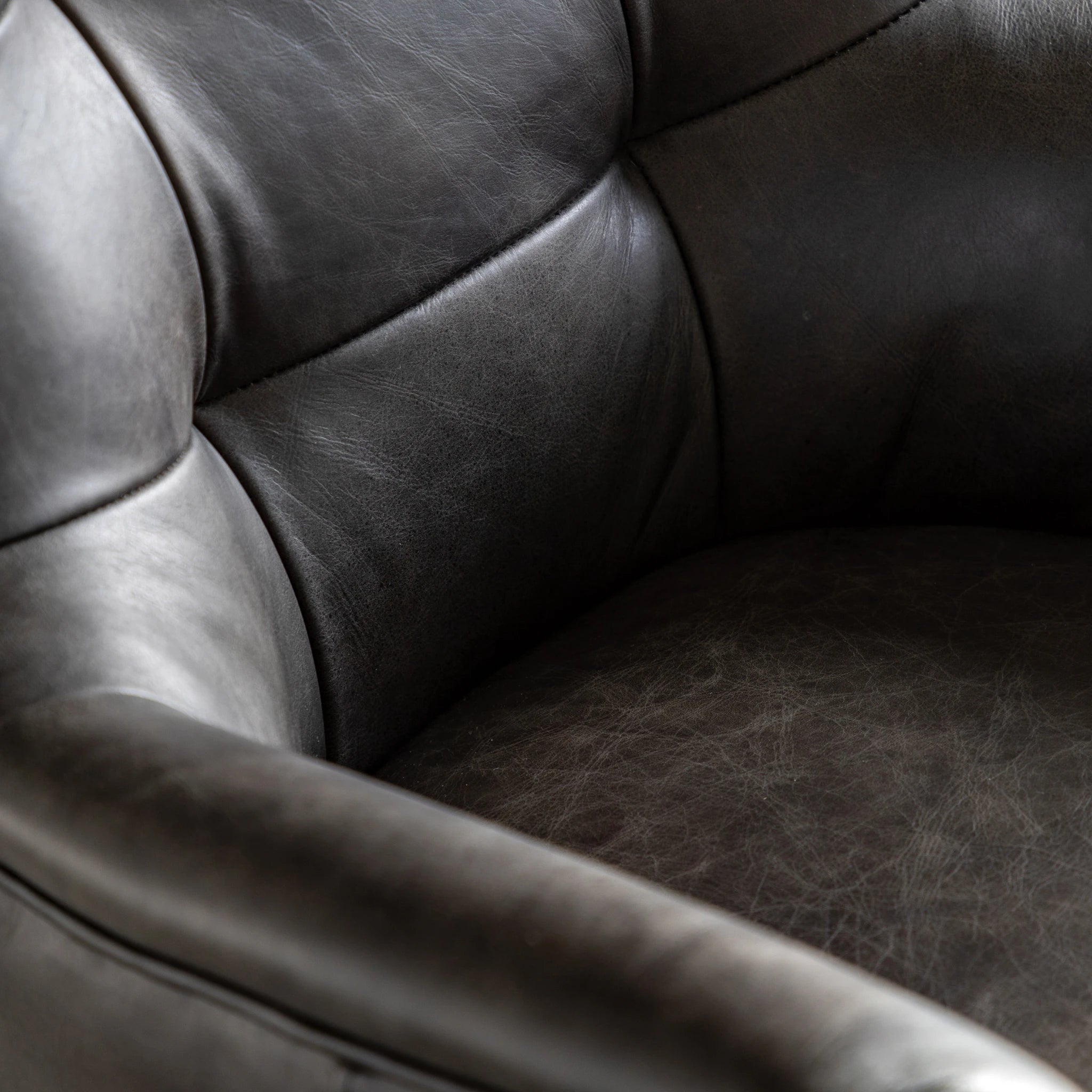 Alderdowns Antique Ebony Leather Swivel Armchair