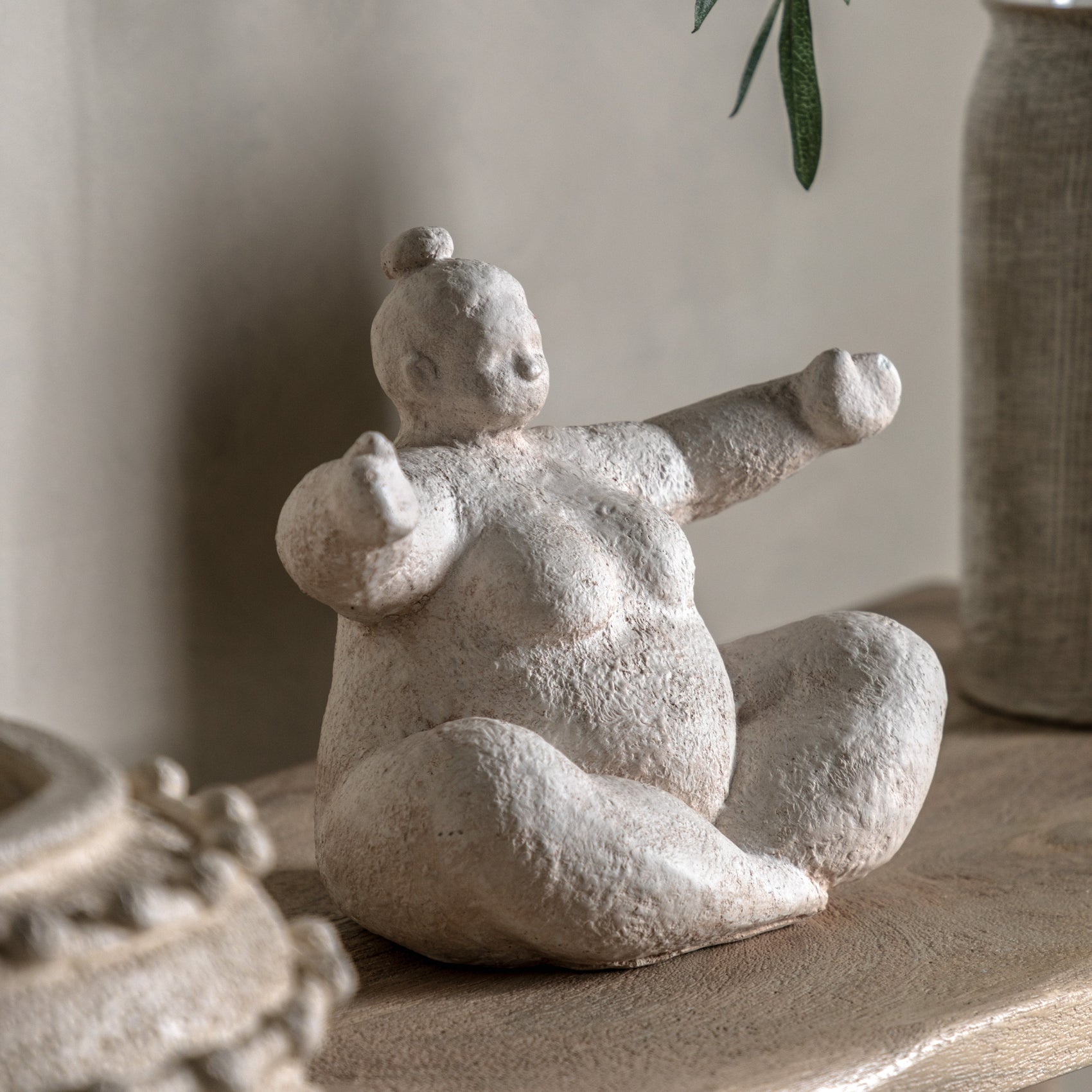 Sitting Lady Arms Open Cement Ornament
