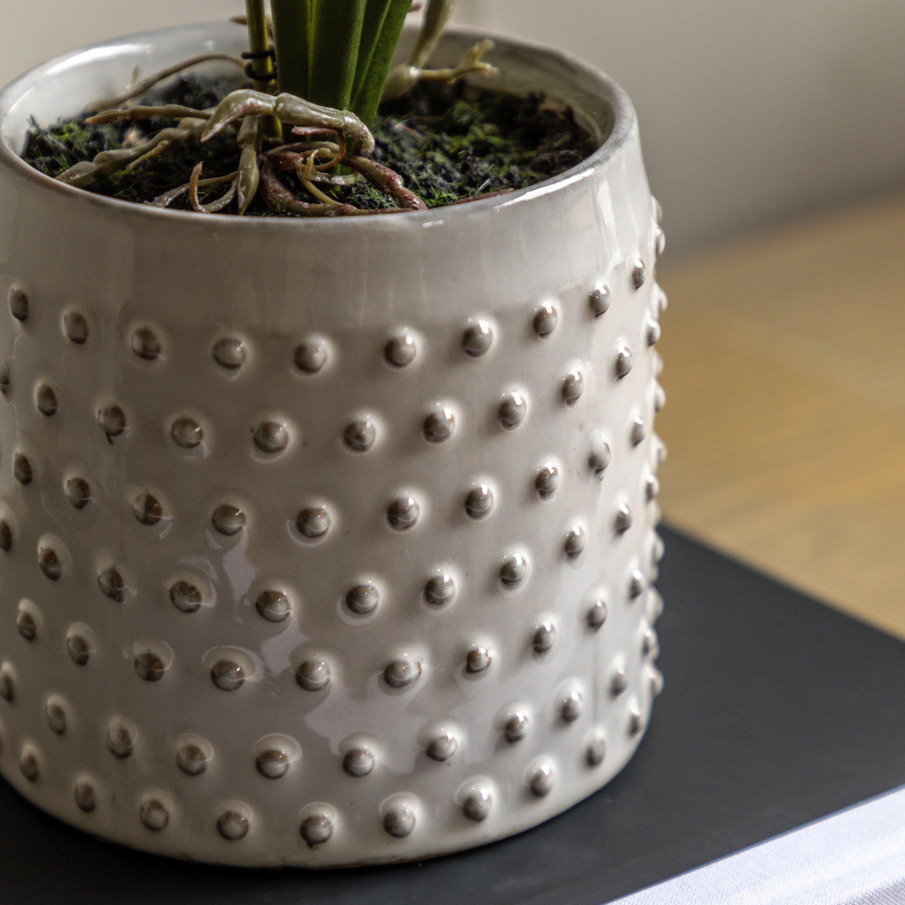 Artificial Orchid Orange in White Ceramic Dot Pot