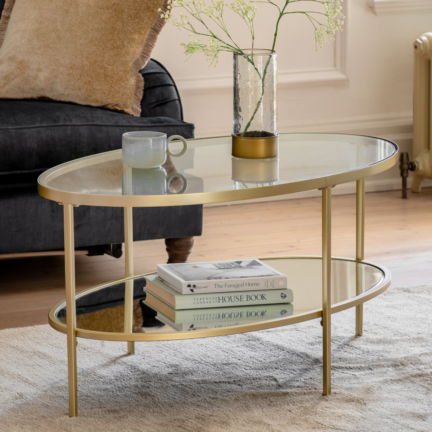 Bellhouse Champagne Gold & Clear Glass Oval Coffee Table