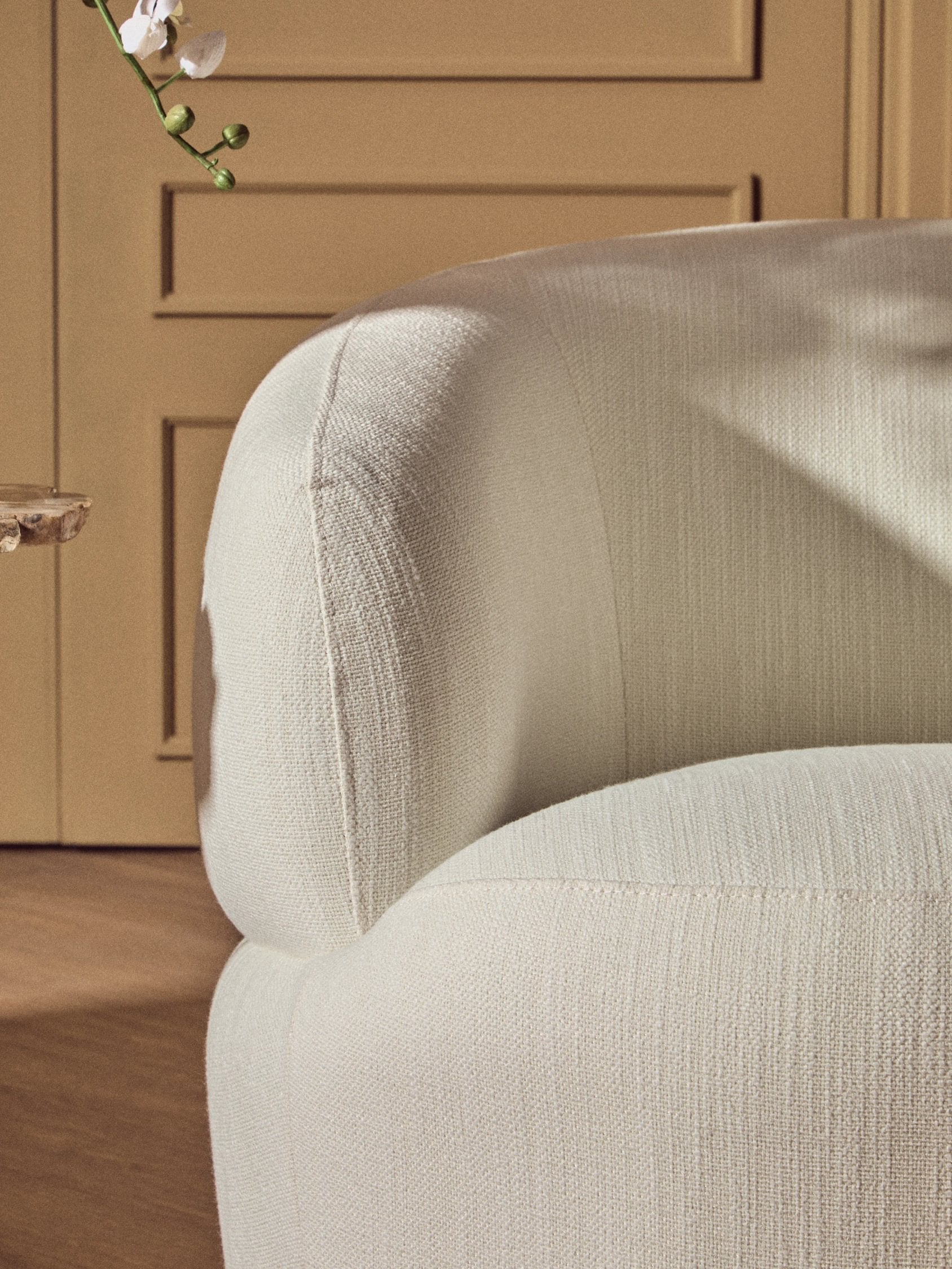 Swell Textured Cream Curved Swivel Chair