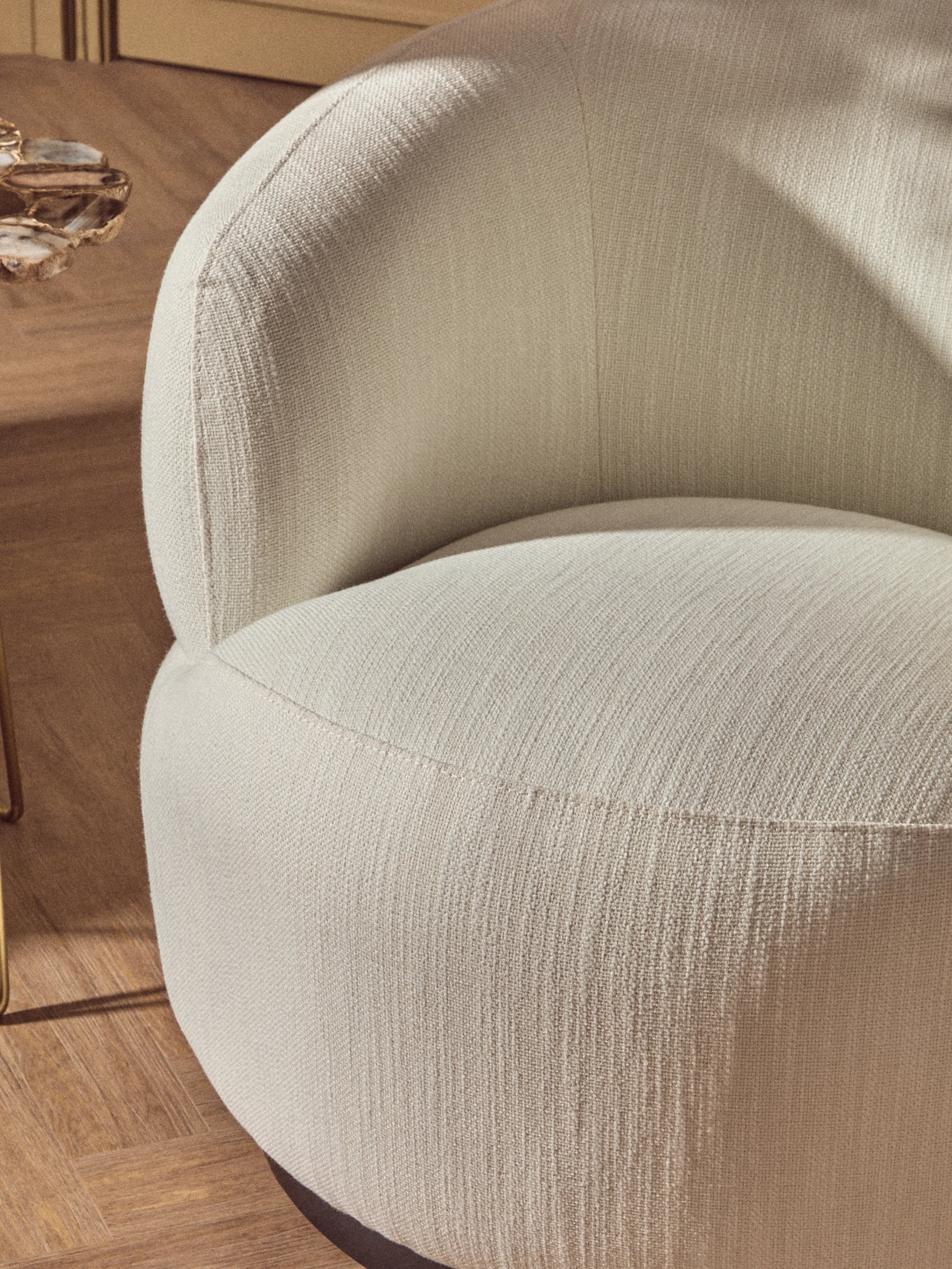 Swell Textured Cream Curved Swivel Chair