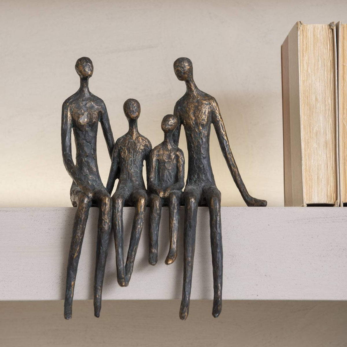 Antique Bronze Sitting Family of Four Shelf Sculpture