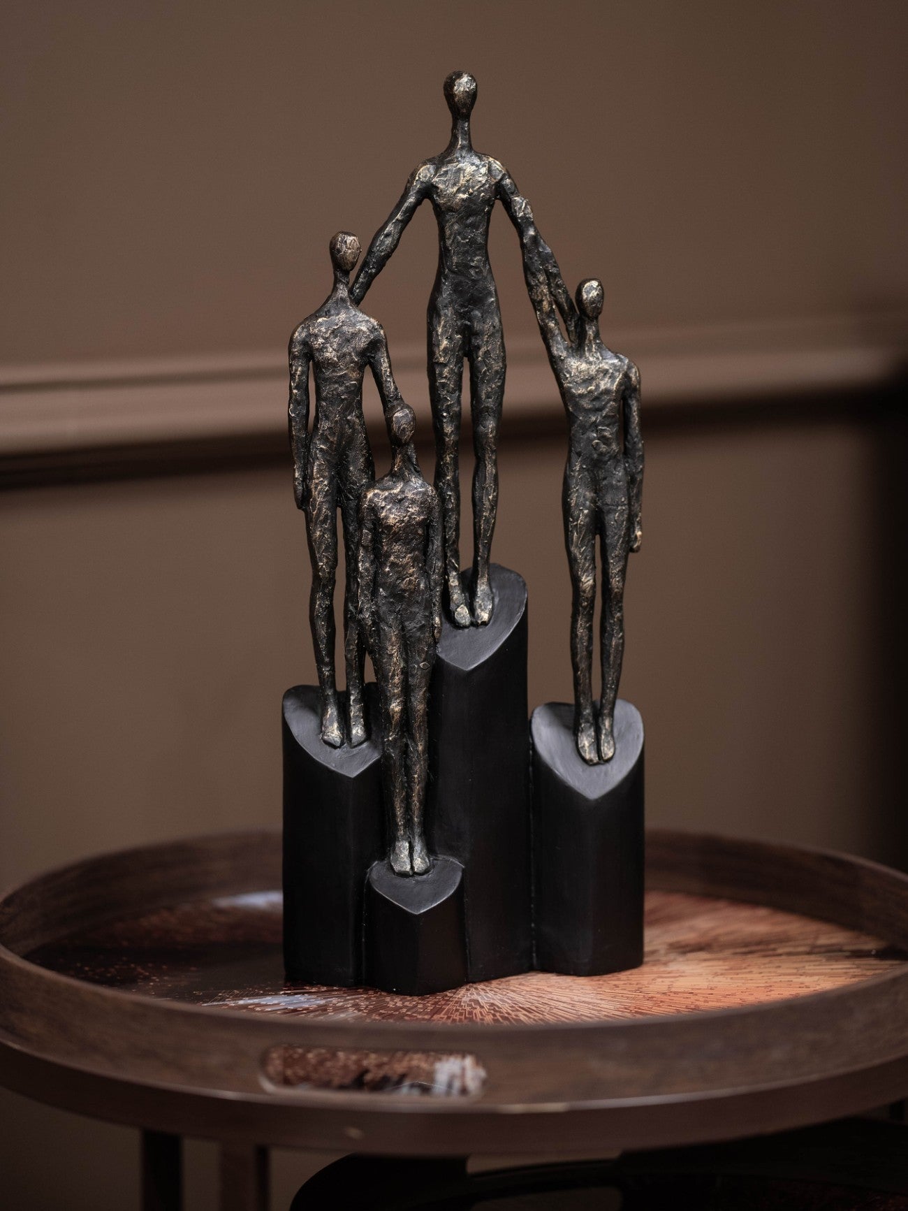 Antique Bronze Abstract Family Sculpture on Hearts Plinth lifestyle