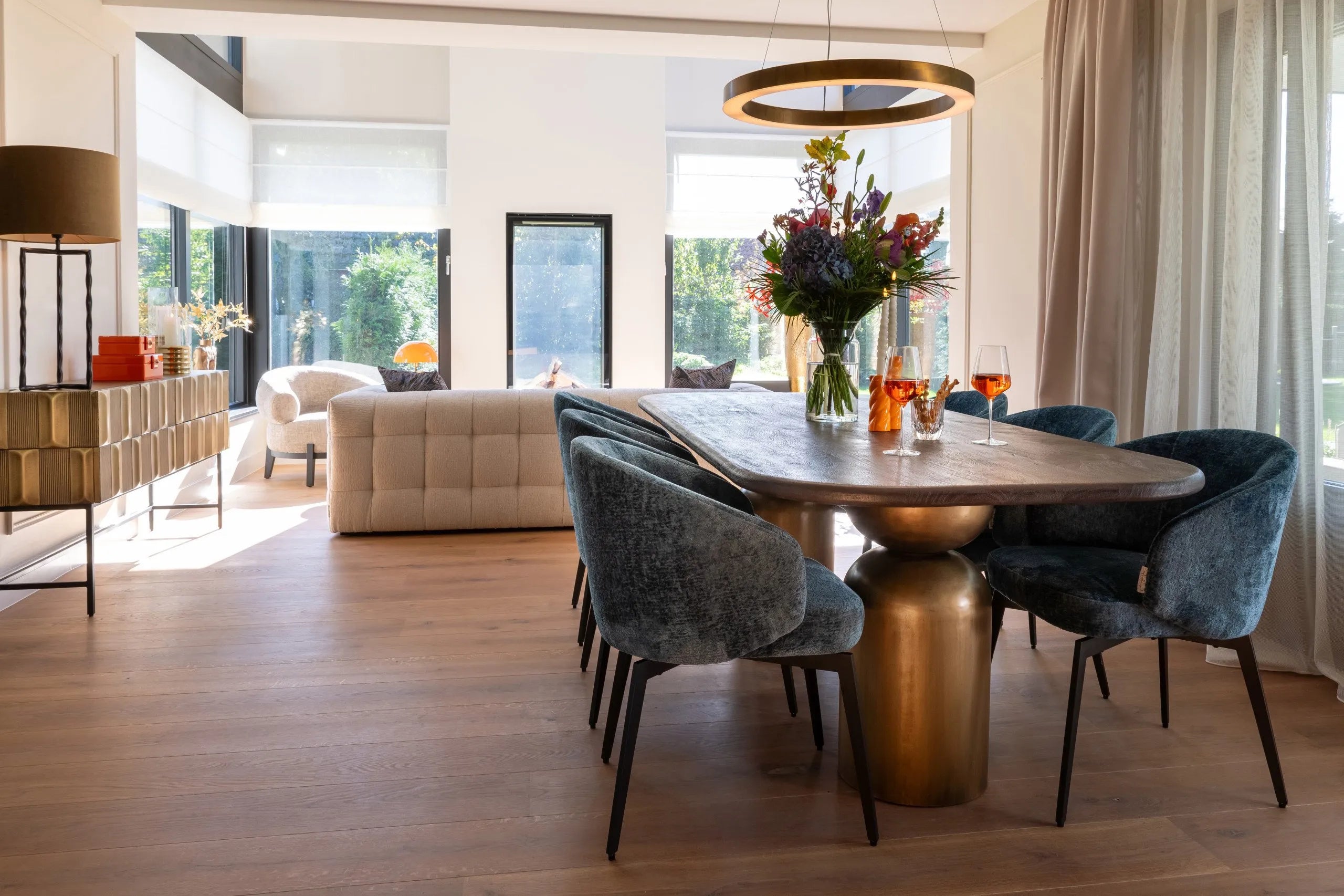 Richmond Interiors Cavo Brushed Gold & Black Acacia Wood Rounded Rectangle Dining Table | 8 Seater