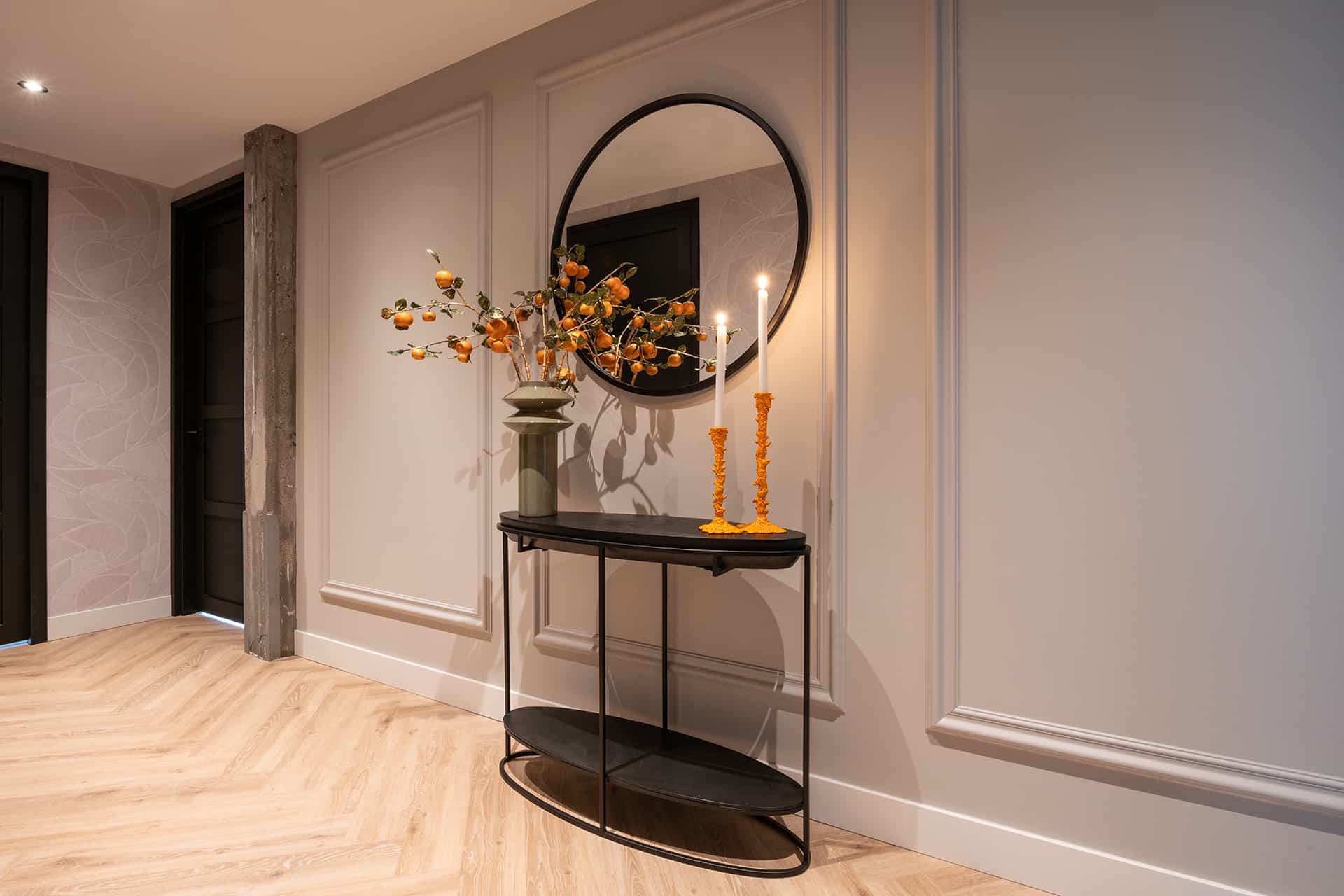 Richmond Interiors Calesta Metallic Black Oval Console Table