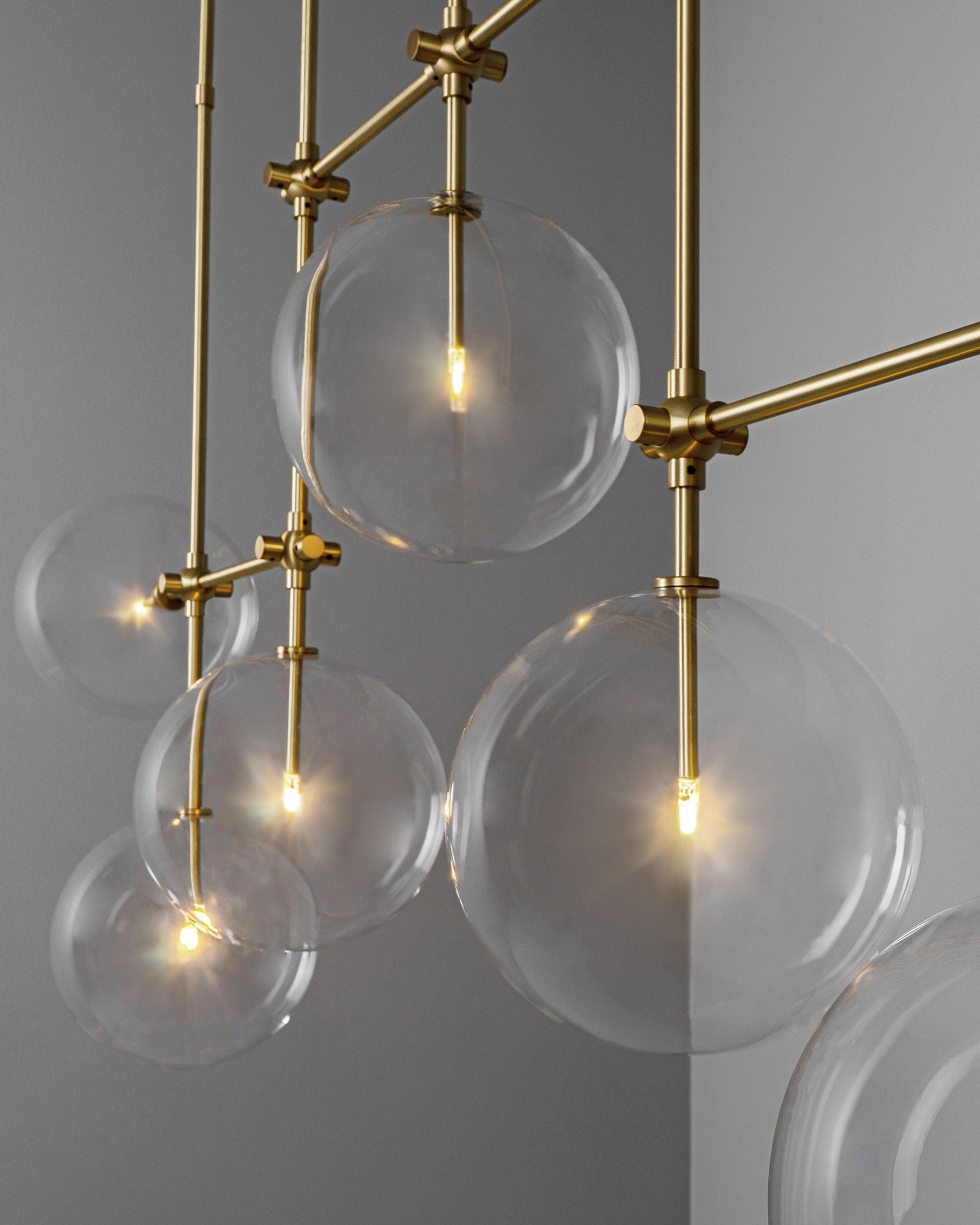 Schwung Soap B7 Burnished Brass Transparent Globe Chandelier Large