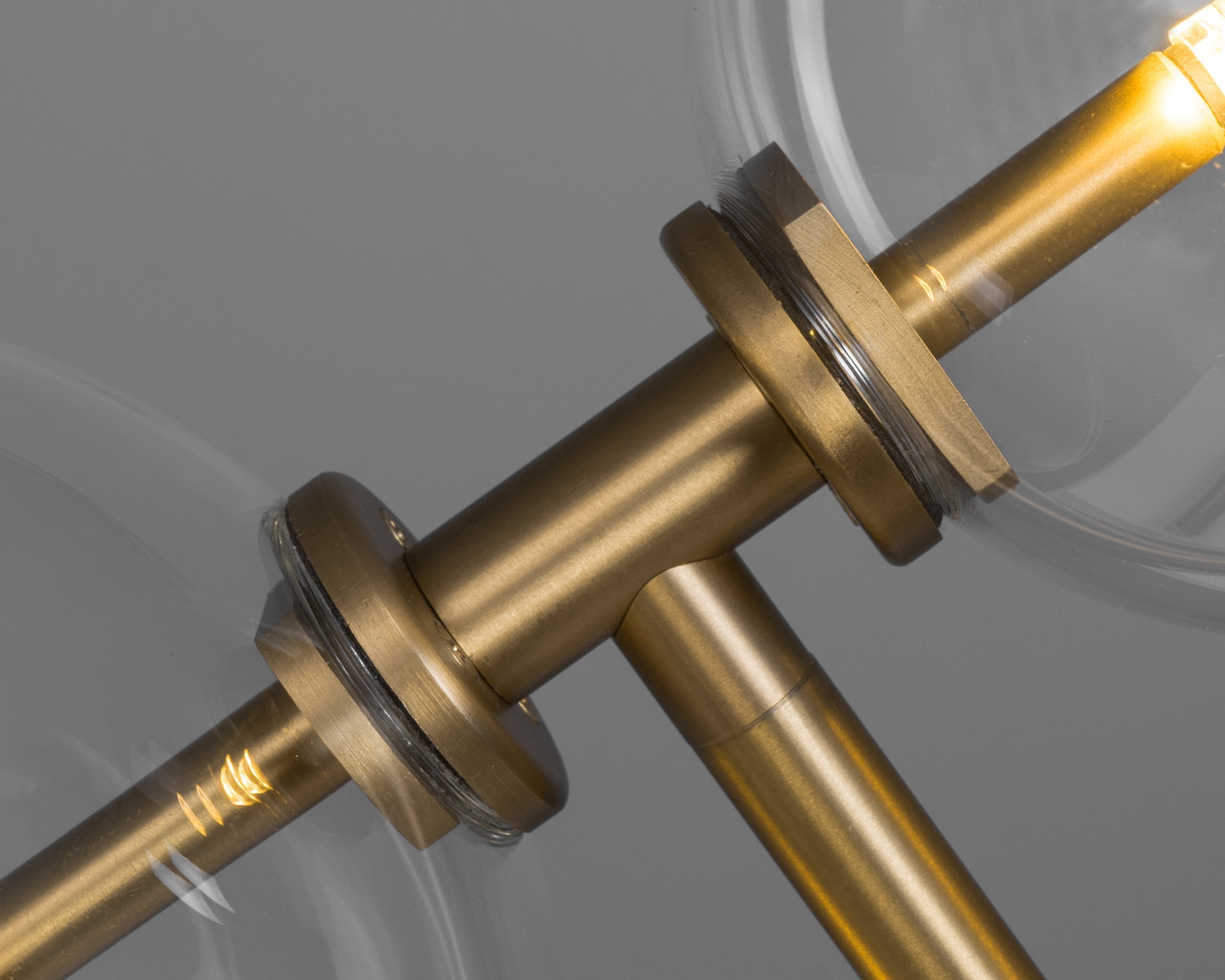 Schwung Zosia Burnished Brass Transparent Globe Table Lamp