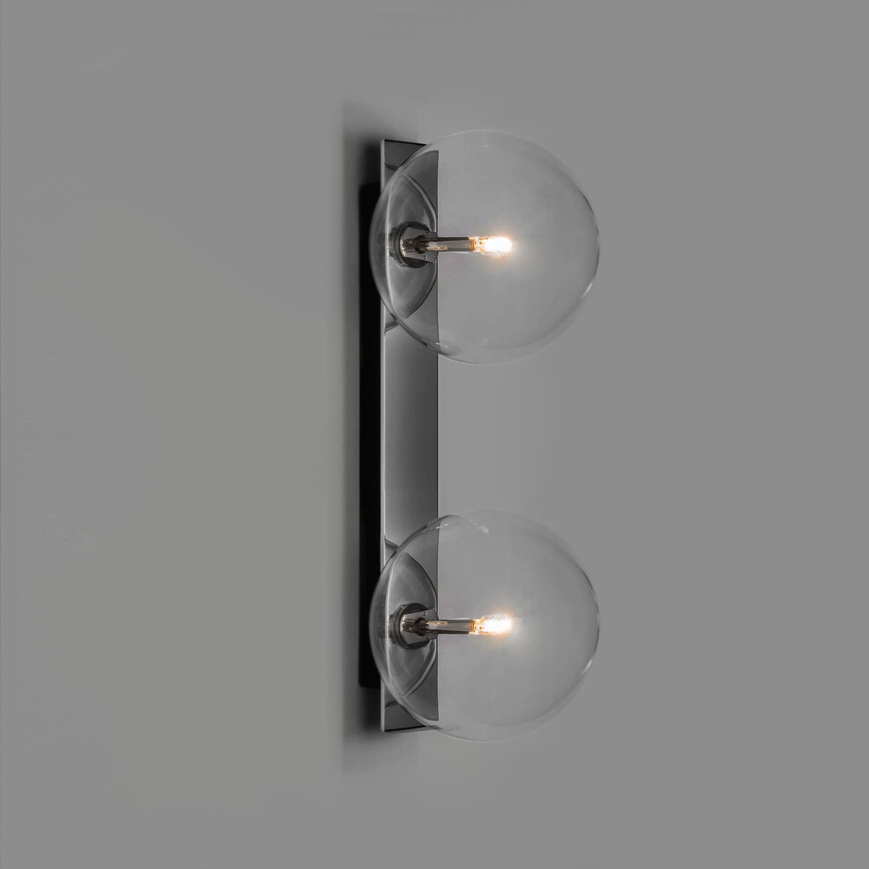 Schwung Oslo Dual Polished Nickel Transparent Globe Wall Light