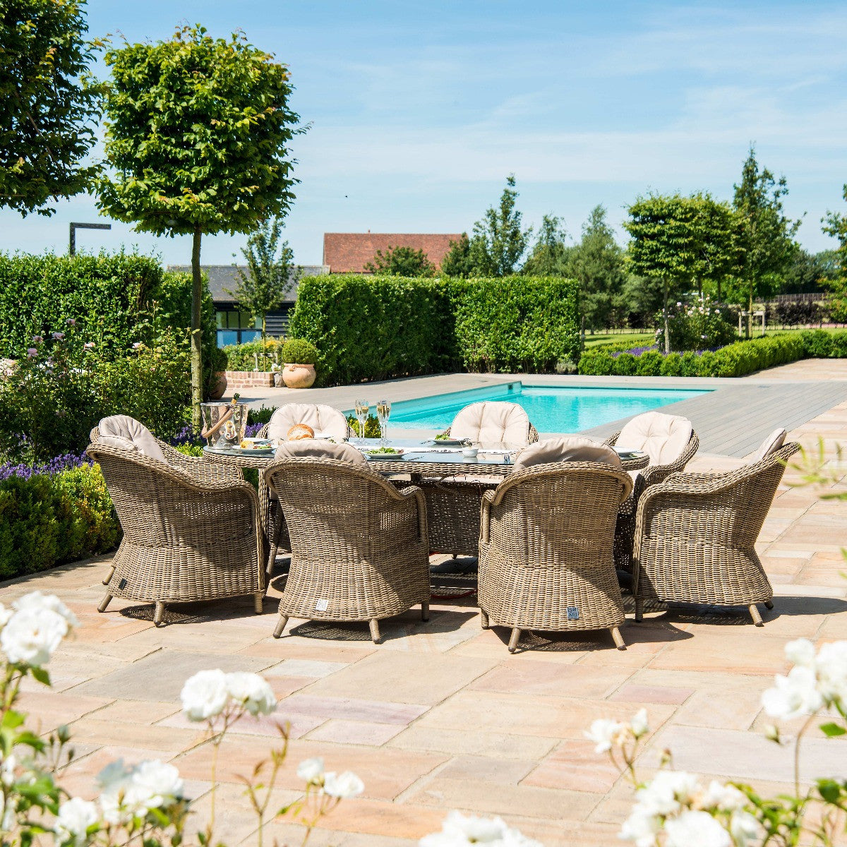 Winchester Brown Rattan Outdoor Oval Dining Set Fire Pit Table with Heritage Chairs | 8 Seater