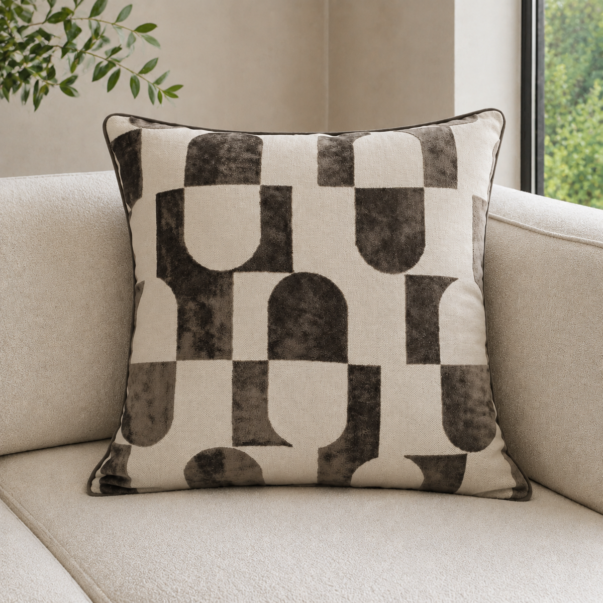 Malini Paul Moneypenny Chillpill Choc Square Cushion 56x56 lifestyle image