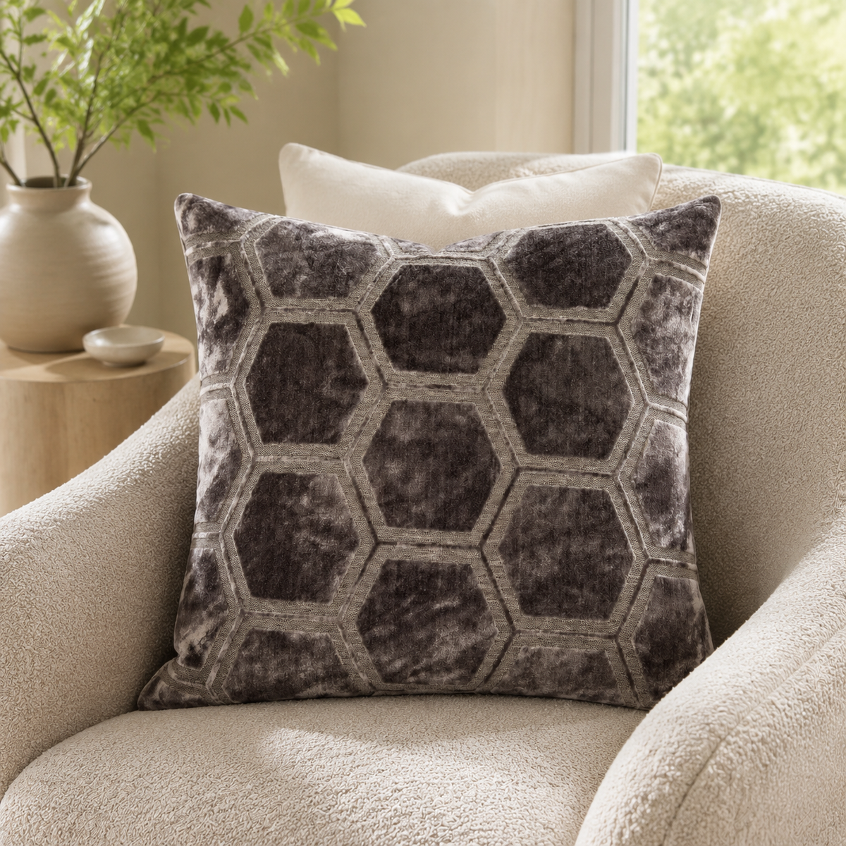 Malini Ivor slate hexagon velvet square cushion 56x56 in a neutral living room
