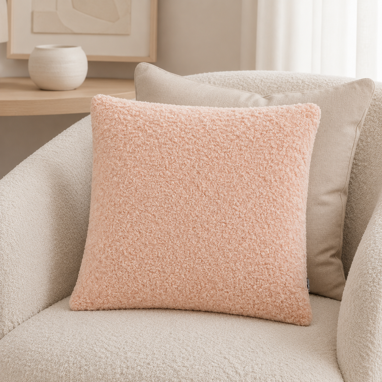 Malini Essence Textured Faux Fur Blush Pink Square Cushion 45x45 styled on light neutral furniture