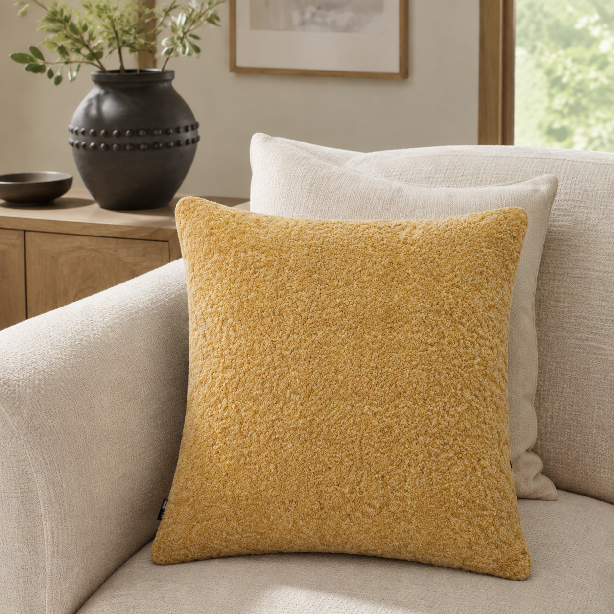 Malini Essence textured faux fur mustard yellow square cushion 45x45 in a neutral living room