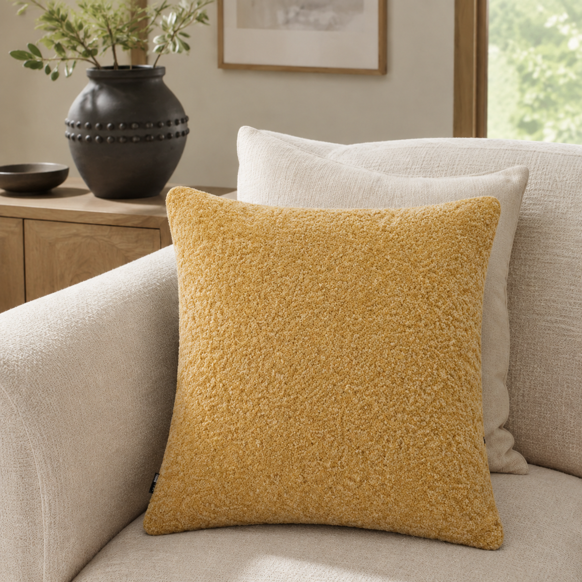 Malini Essence textured faux fur mustard yellow square cushion 45x45 in a neutral living room