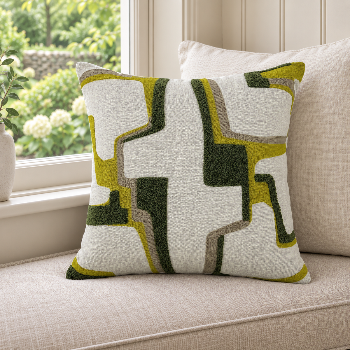 Malini Alto Green Square Cushion 43x43 in a cosy interior with natural daylight