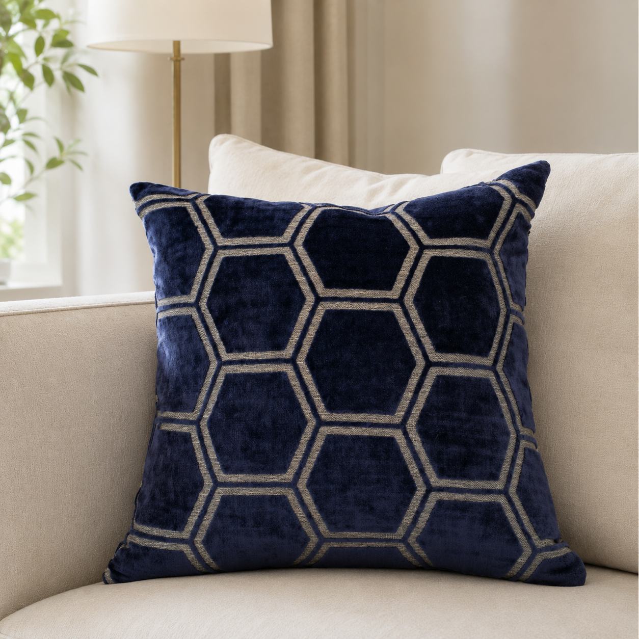 Malini Ivor navy hexagon velvet square cushion 43x43 in a neutral living room