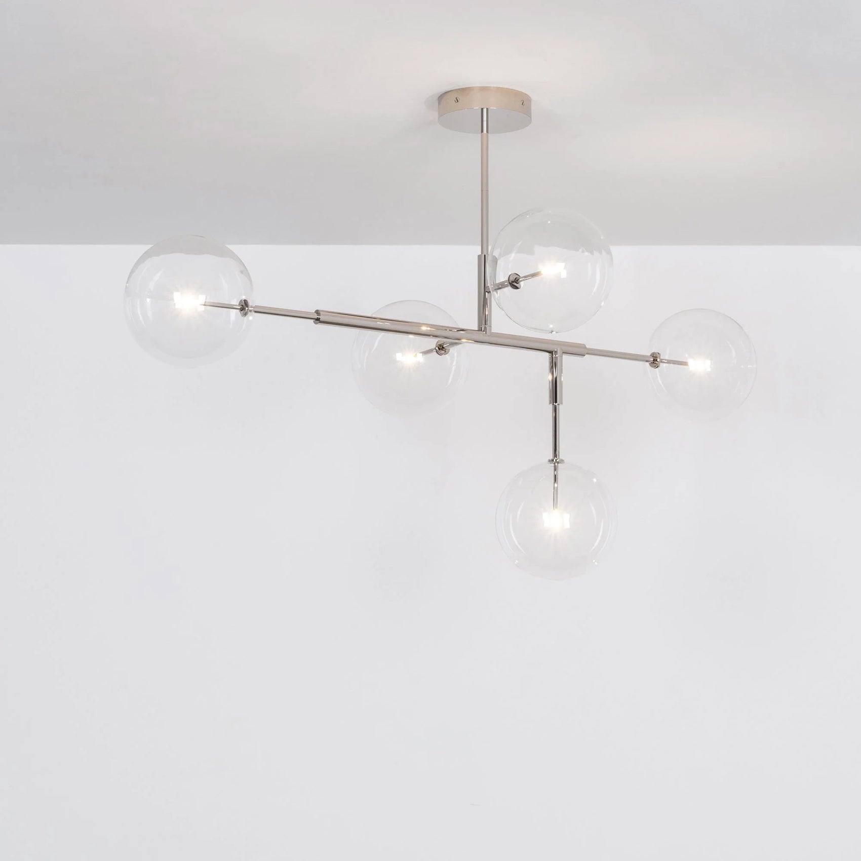 Schwung Axis Polished Nickel Transparent Globe Ceiling Light