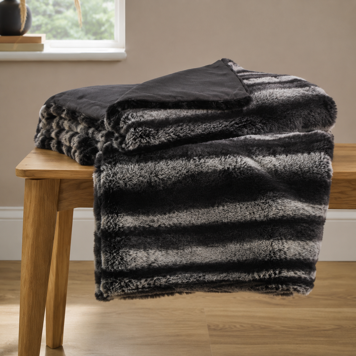 Malini Dalston Charcoal Stripe Faux Fur Throw realistic lifestyle image