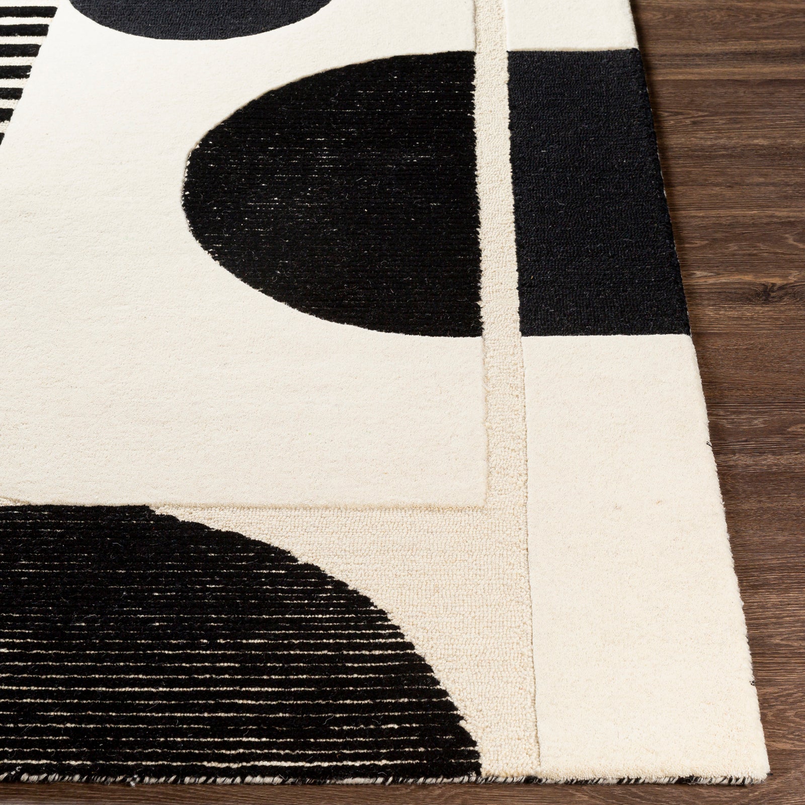 Brooklyn Modern Hand Tufted Wool Black & Cream Rug 152x229cm - reverse roll detail