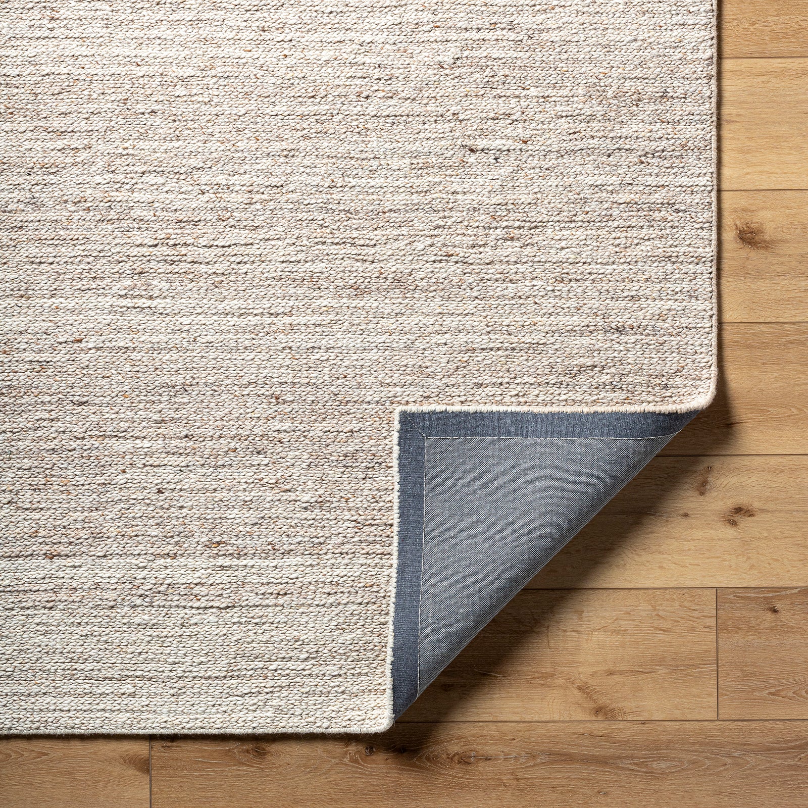 Derby Cottage Wool Cottage Beige & Ivory Rug 152x229cm - folded detail