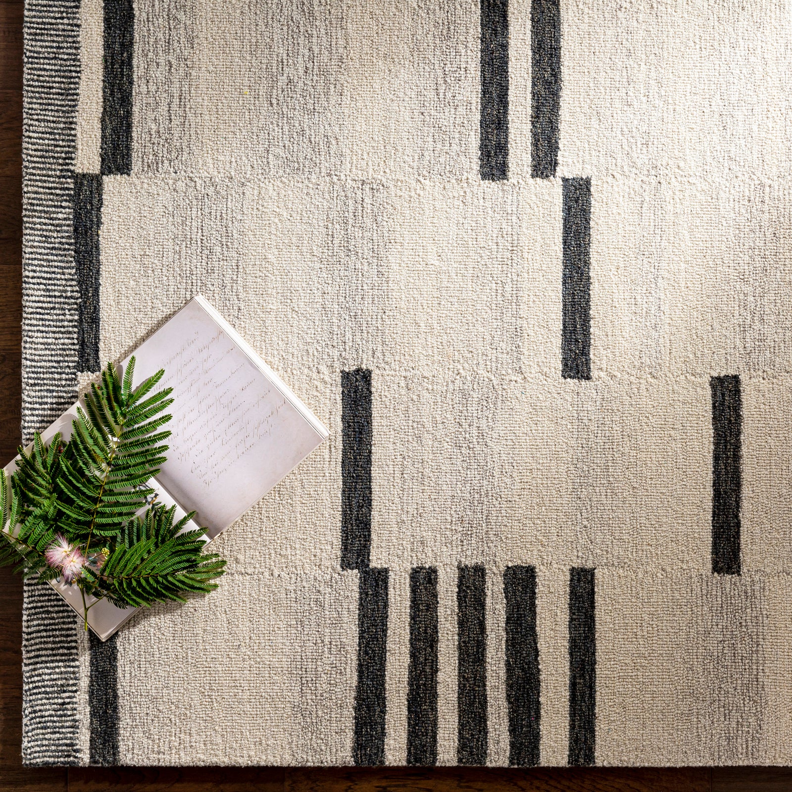 Granada Global Hand Tufted Beige & Black Wool Rug 122x183cm - styled detail