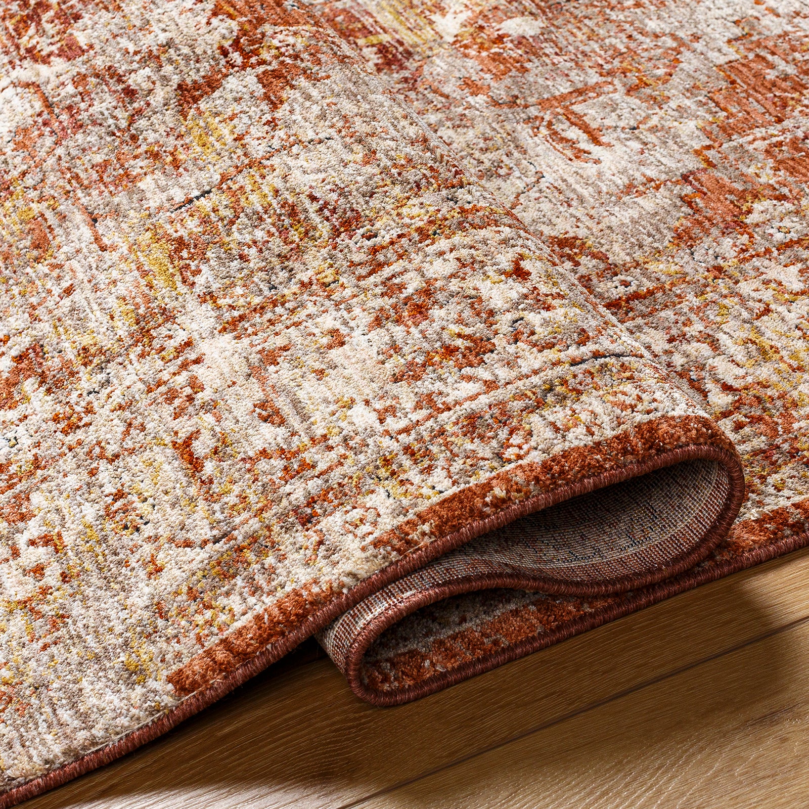 Mirabel Vintage Traditional Boho Fringe Brown & Dusty Coral Polyester Rug 152x225cm - folded detail
