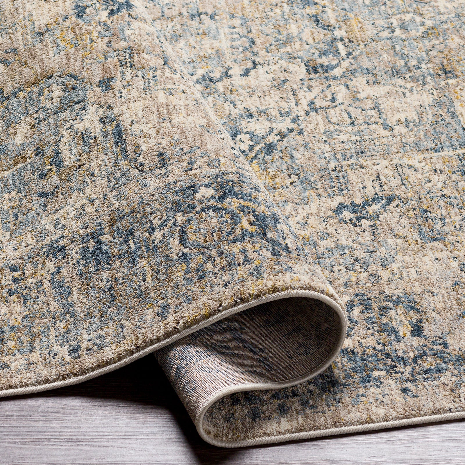 Mirabel Vintage Traditional Boho Fringe Beige & Teal Polyester Rug 152x225cm - folded detail