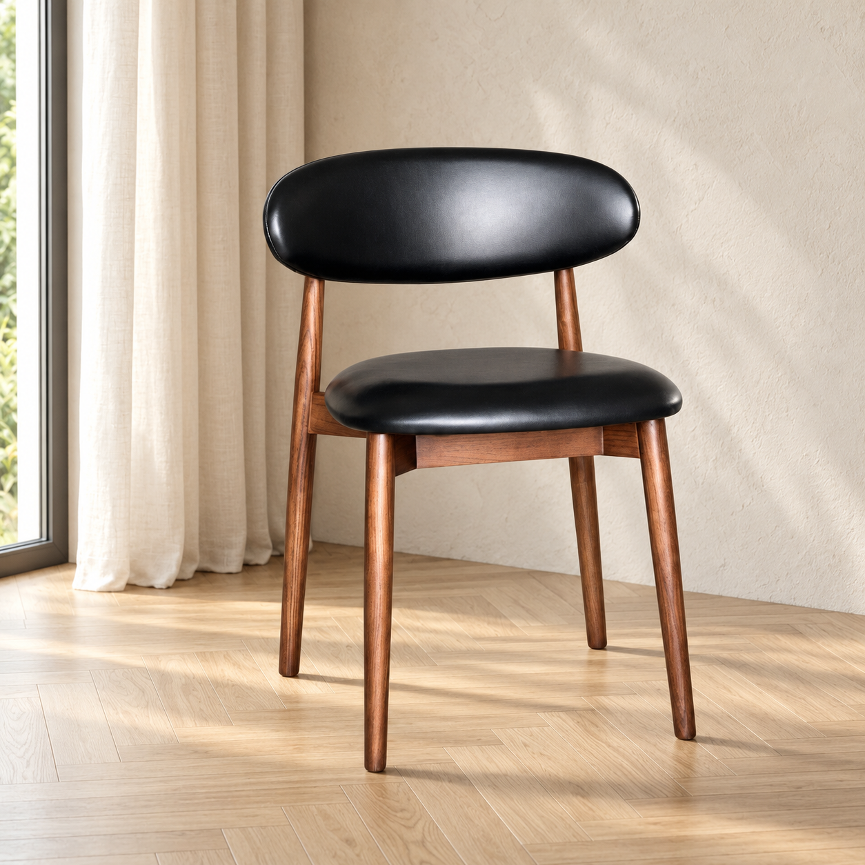 Elin Black Faux Leather Oak Dining Chair (Dark Leg) in a softly lit neutral interior