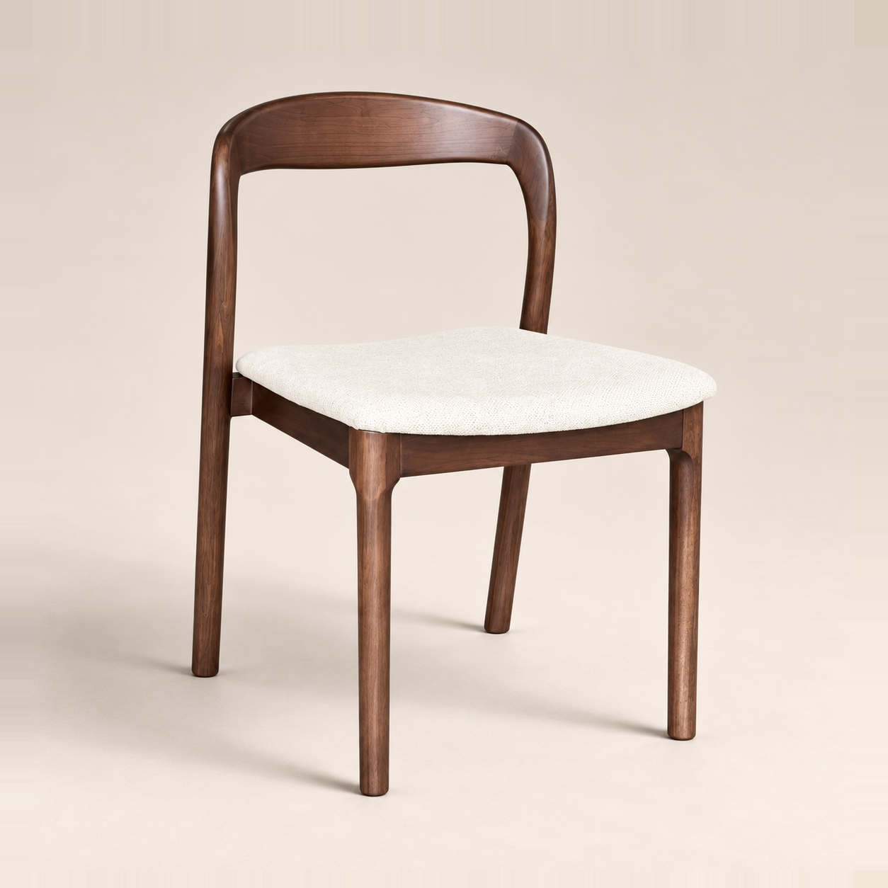 Oren Cream Boucle Dark Leg Dining Chair (Crib 5) on a warm neutral studio background