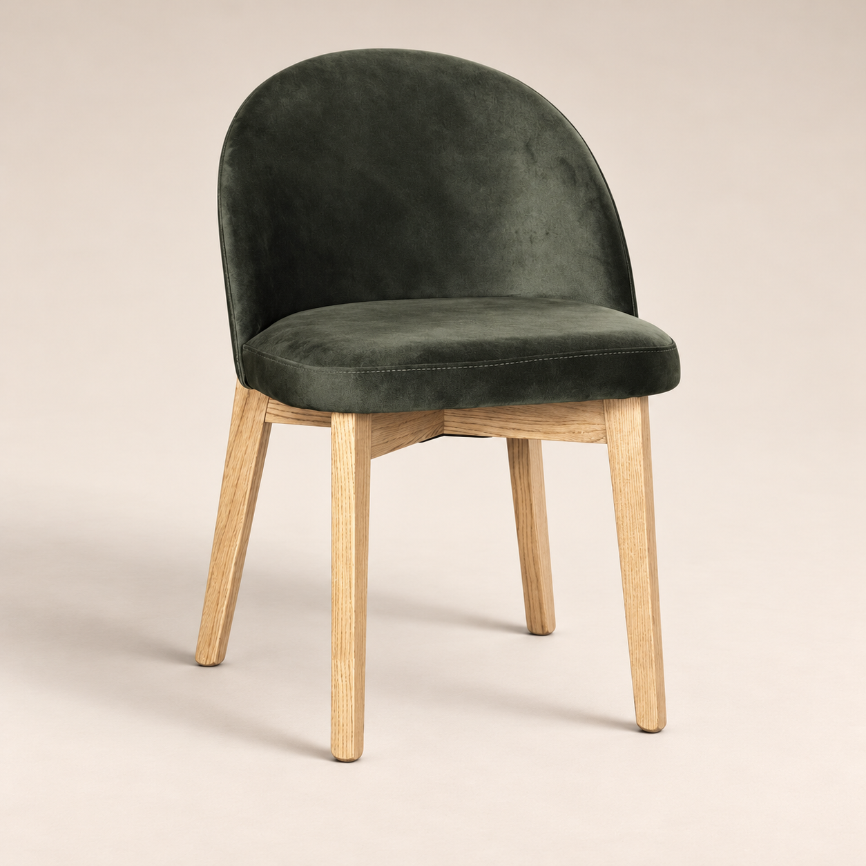 Luma Green Velvet Light Oak Leg Dining Chair (Crib 5) on a warm neutral studio background