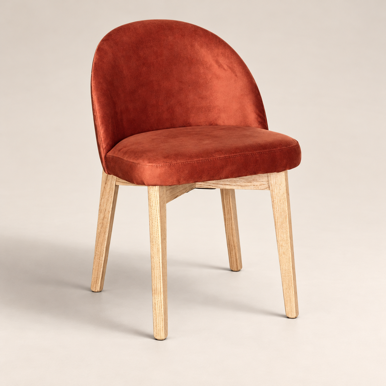 Luma Orange Rust Velvet Light Oak Leg Dining Chair (Crib 5) on a warm neutral studio background