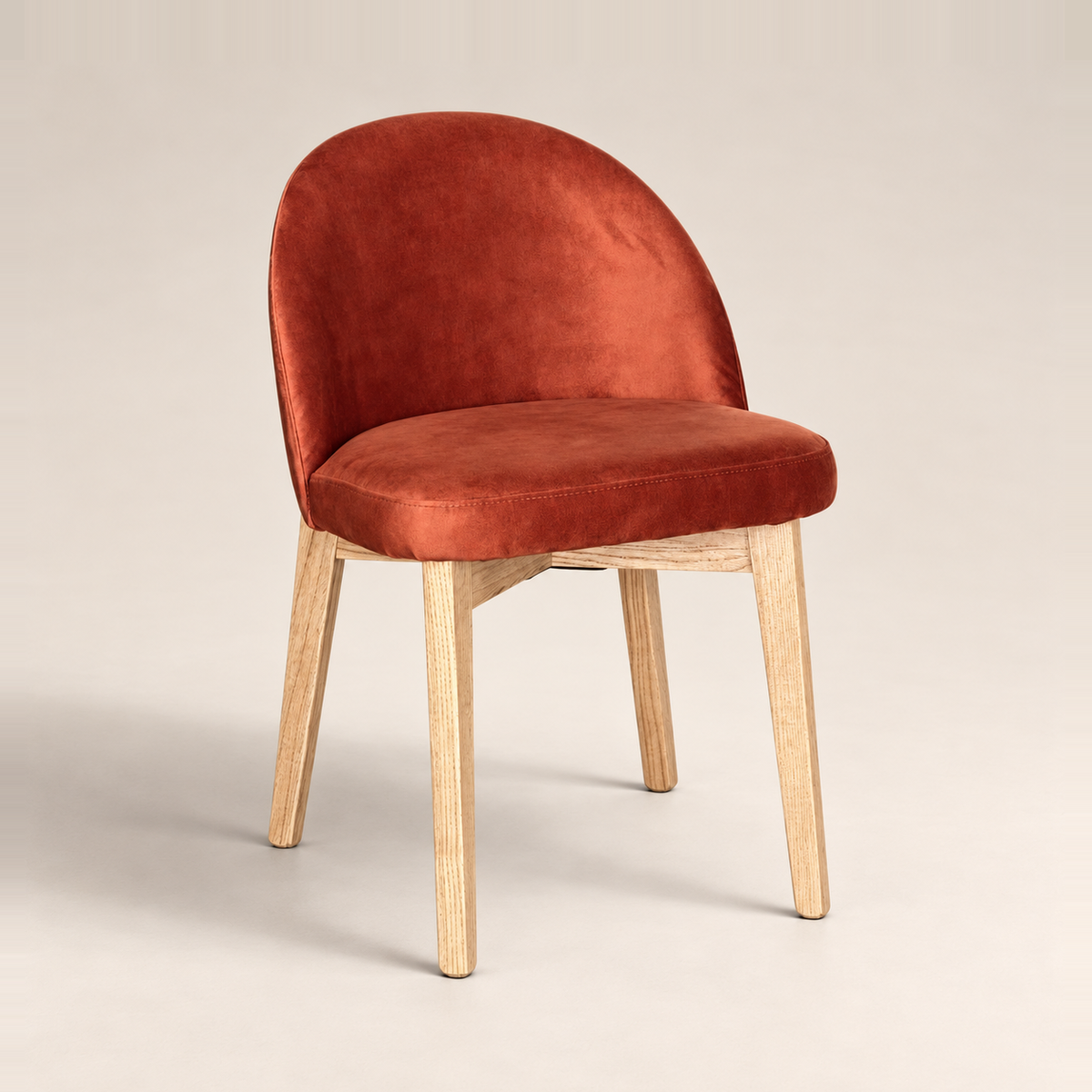Luma Orange Rust Velvet Light Oak Leg Dining Chair (Crib 5) on a warm neutral studio background
