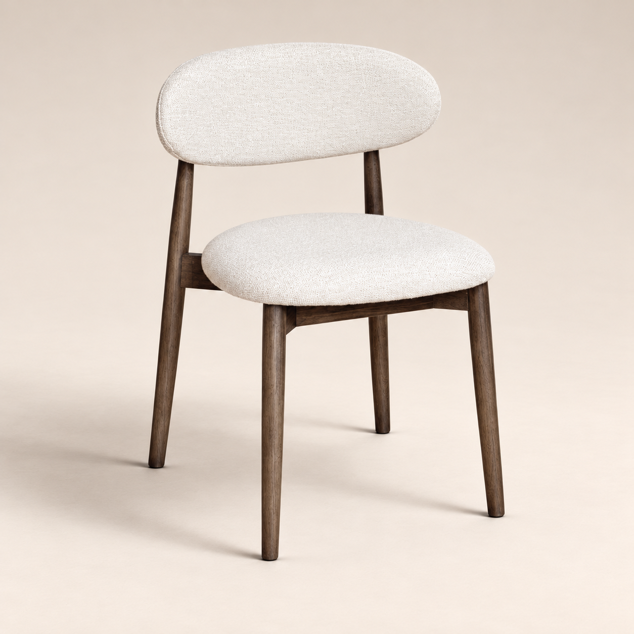 Elin Cream Boucle Oak Dining Chair - Dark Leg on a warm neutral studio background