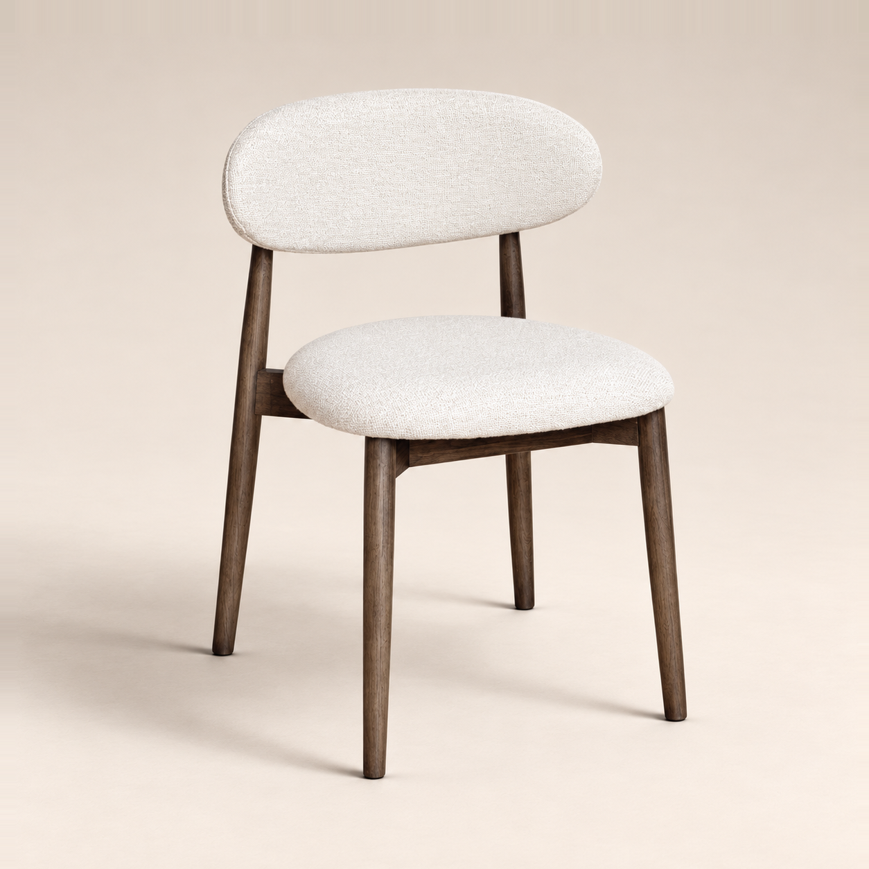 Elin Cream Boucle Oak Dining Chair - Dark Leg on a warm neutral studio background