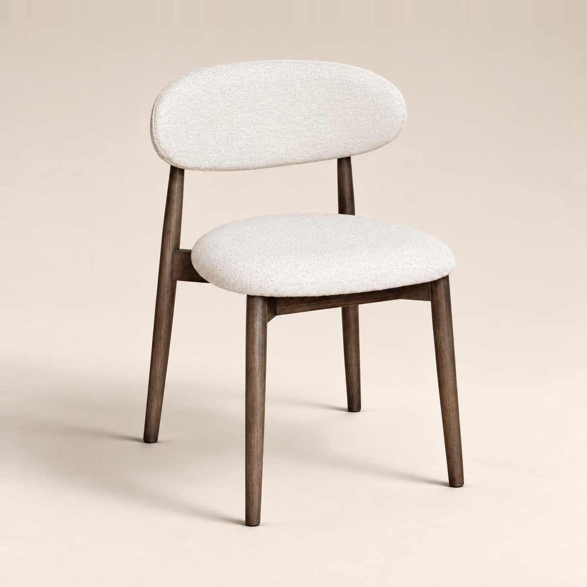 Elin Cream Boucle Oak Dining Chair - Dark Leg on a warm neutral studio background