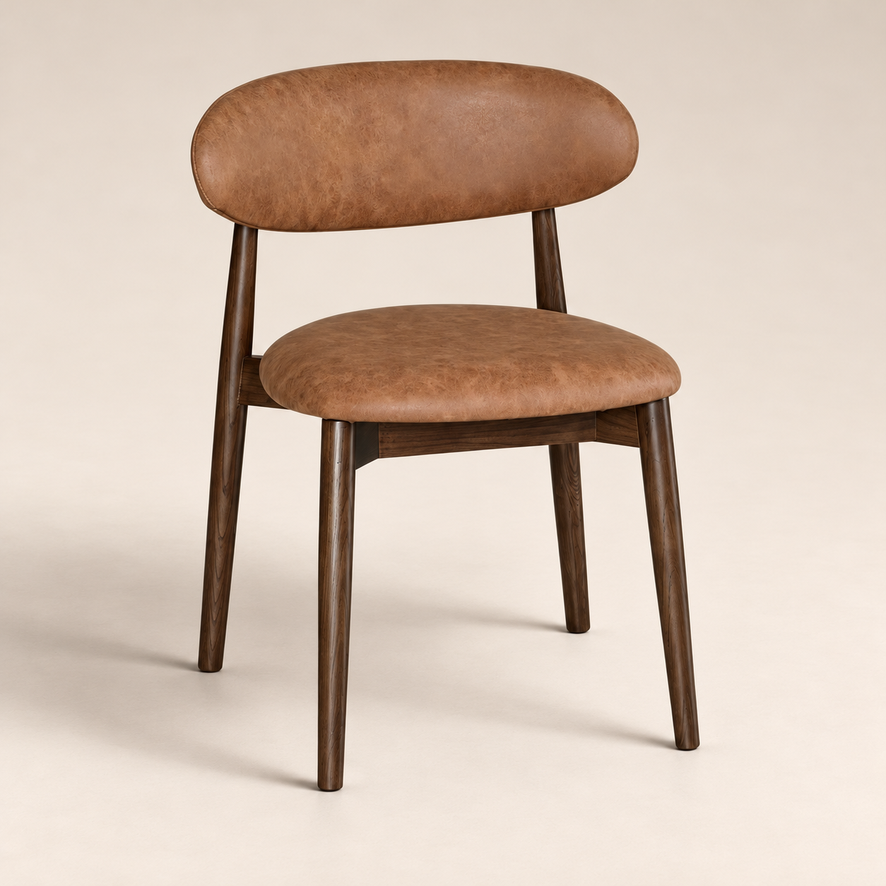 Elin Tan Faux Leather Oak Dining Chair (Dark Leg) on a warm neutral studio background