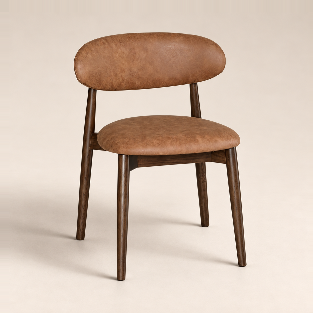 Elin Tan Faux Leather Oak Dining Chair (Dark Leg) on a warm neutral studio background