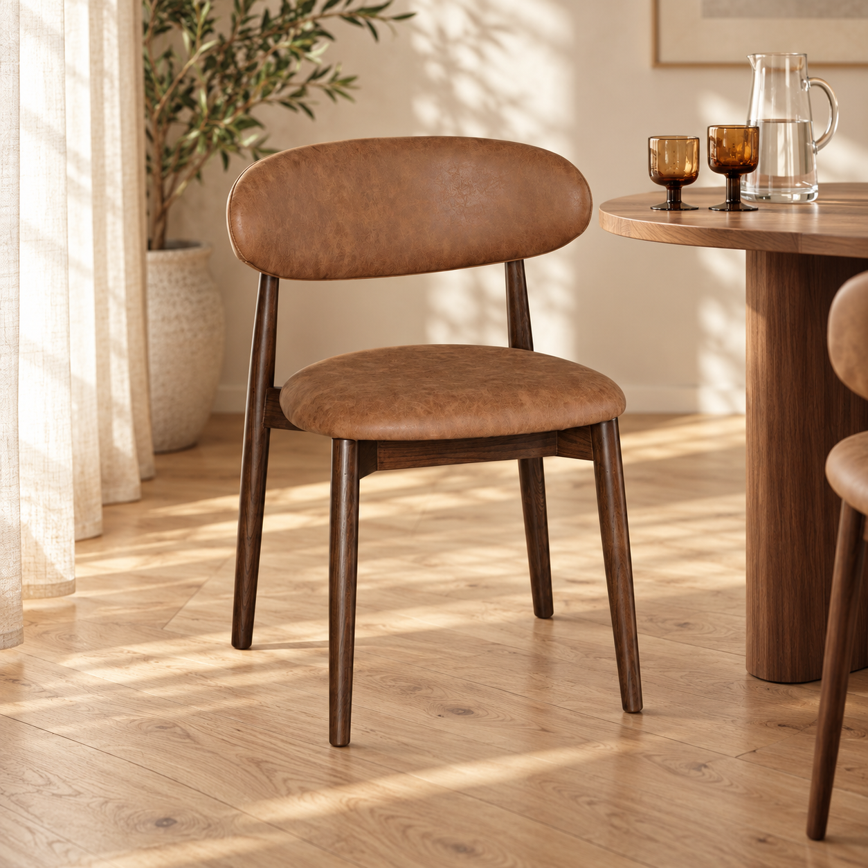 Elin Tan Faux Leather Oak Dining Chair (Dark Leg) in a sunlit styled dining room