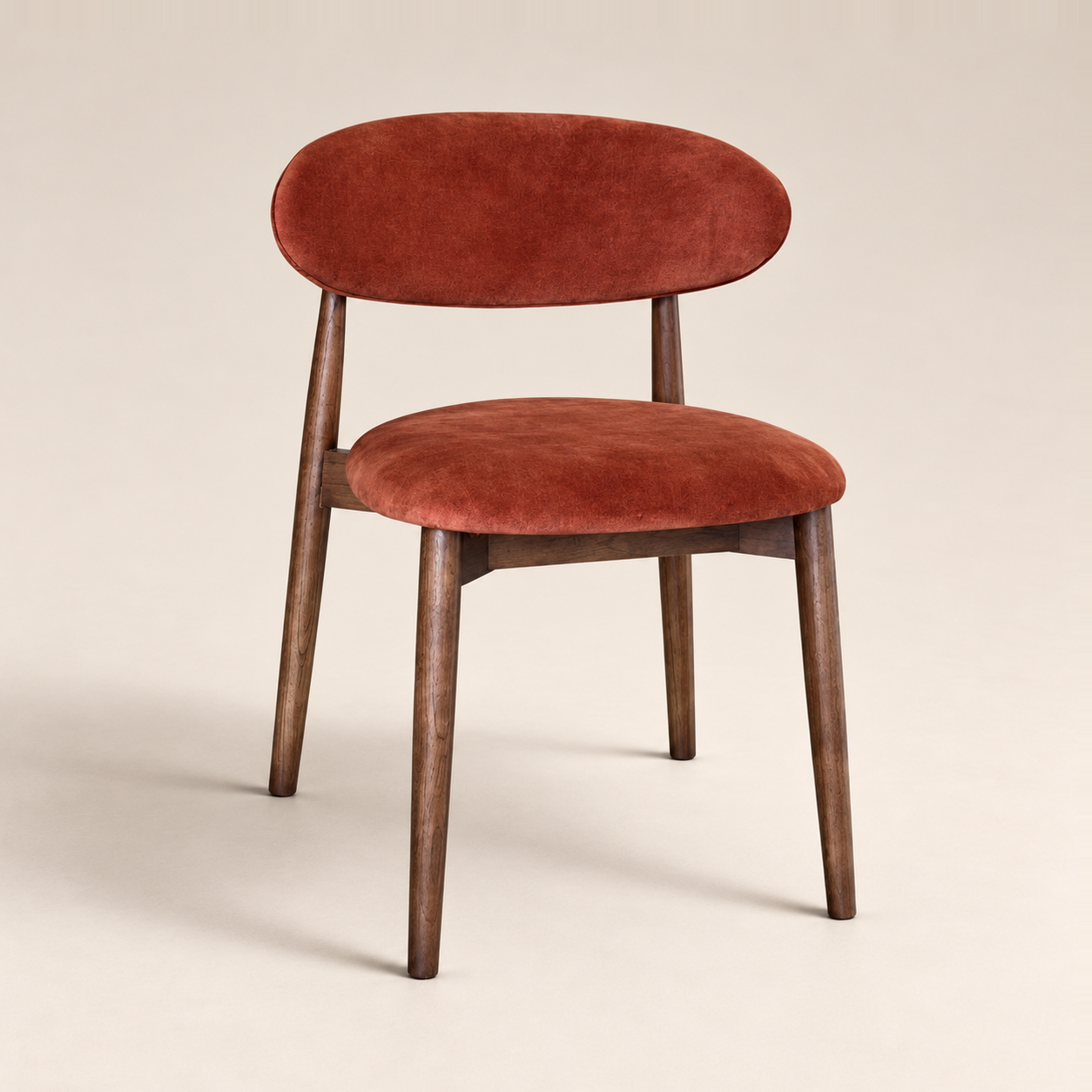 Elin Orange/Rust Velvet Oak Dining Chair - Dark Leg on a warm neutral studio background
