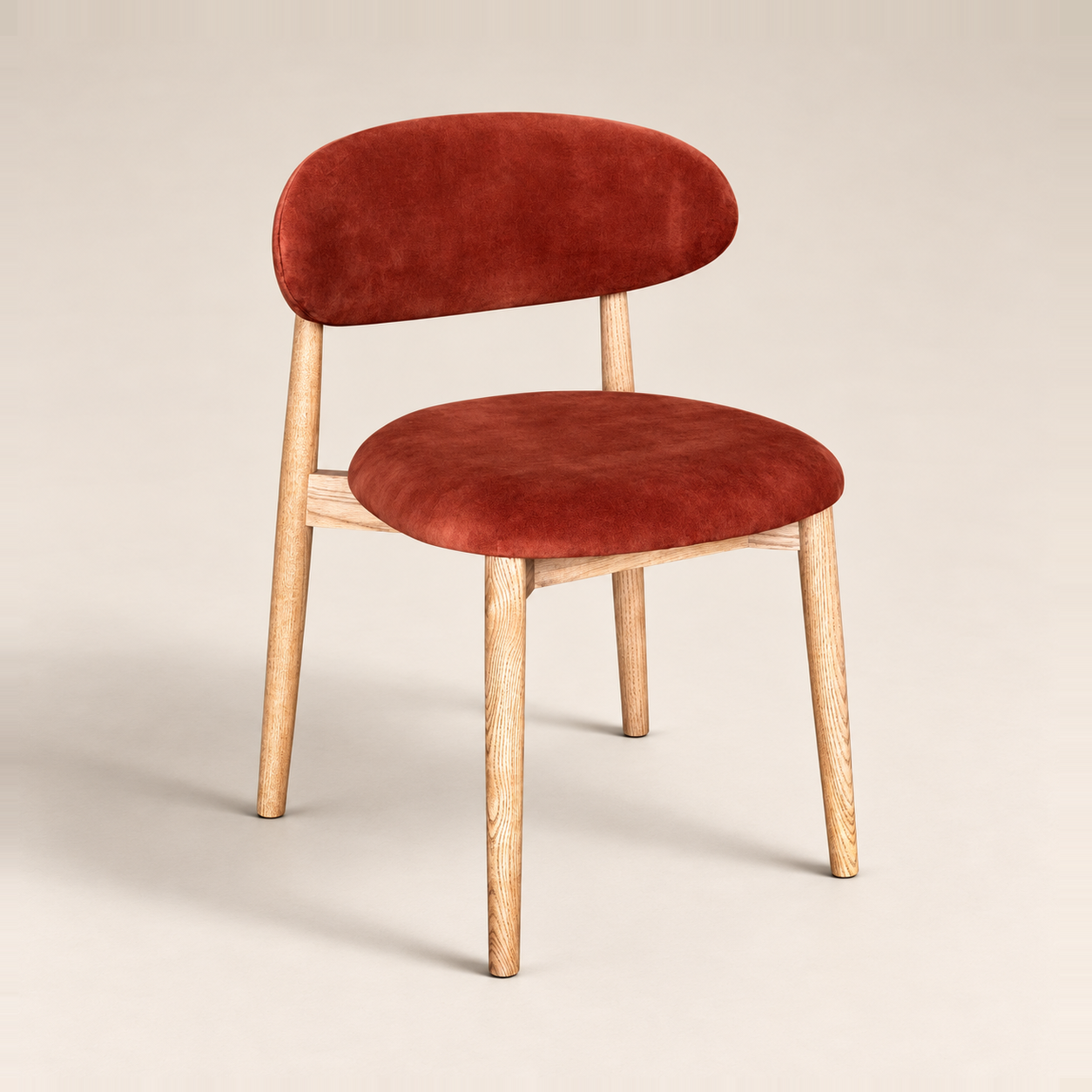 Elin Orange Rust Velvet Oak Dining Chair - Light Leg on a warm neutral studio background